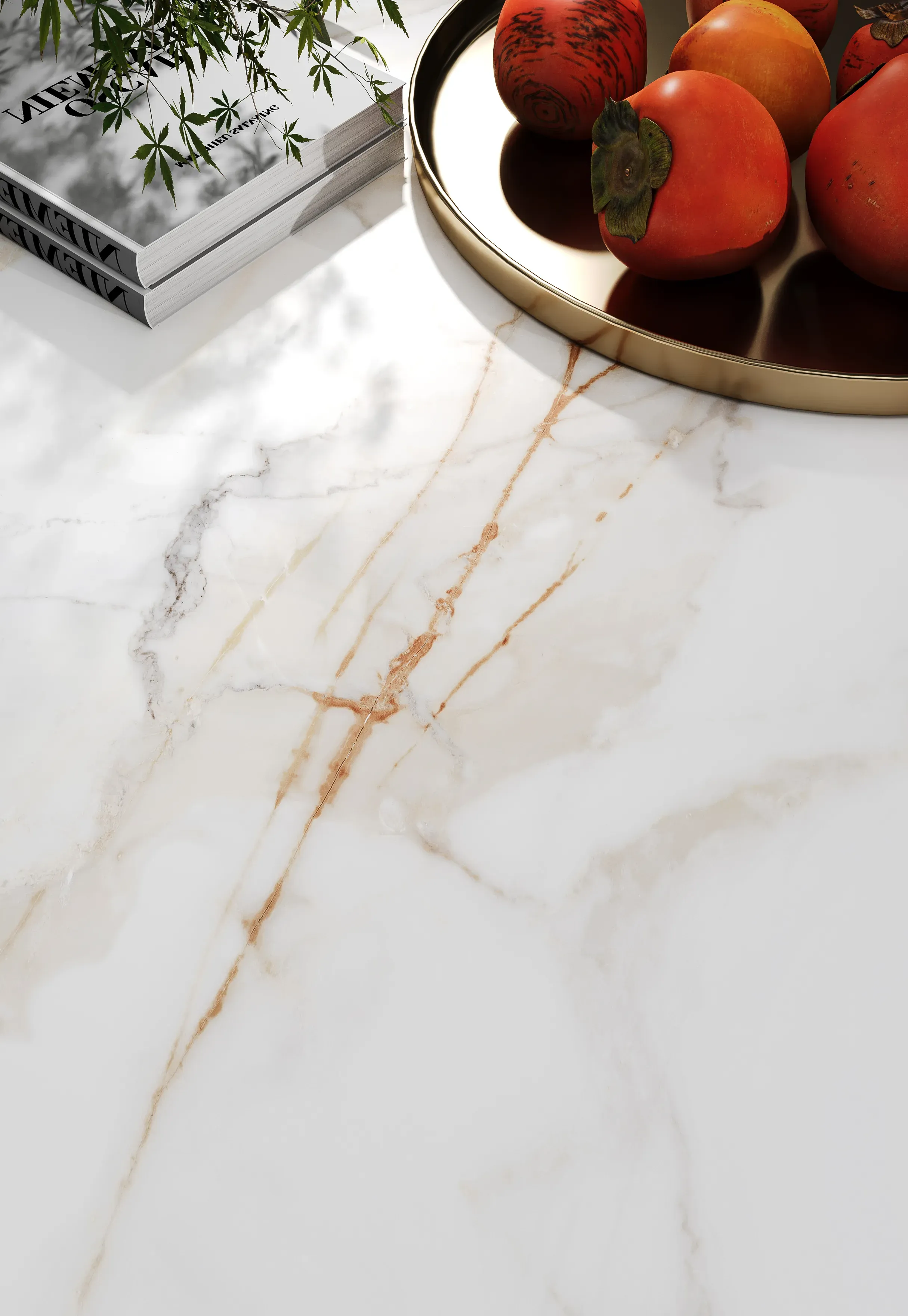 Close view of warm veining across a Calacatta Golden countertop
