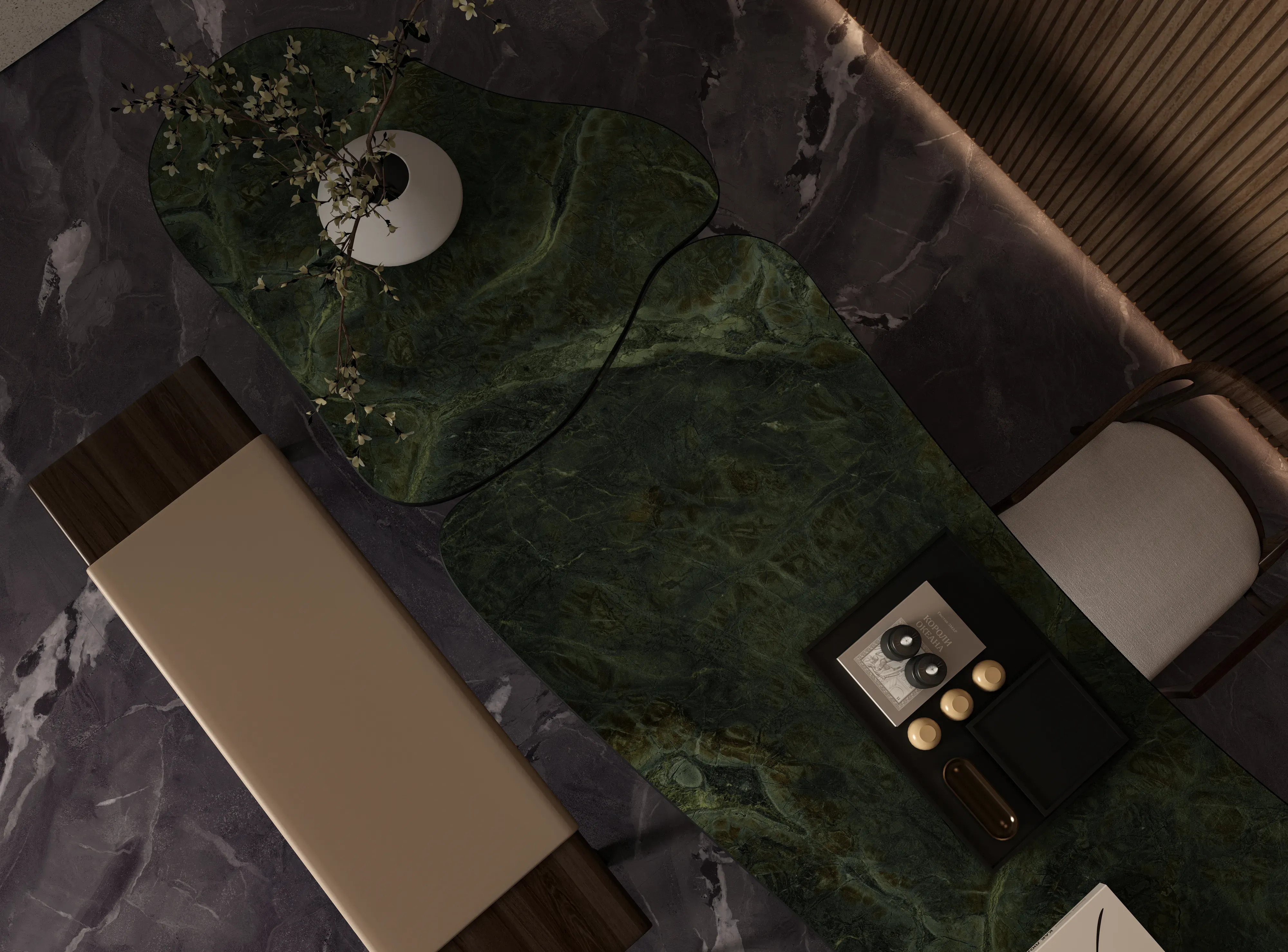 Overhead view of sculptural Verde Vittoria porcelain tables
